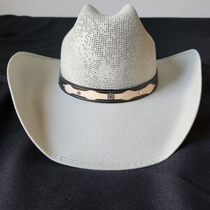 Cream Cowboy hat with Black hat band.